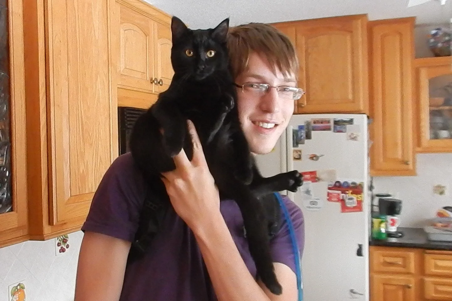 David and his late cat, Kuro, who passed away in 2020 from a lung disease